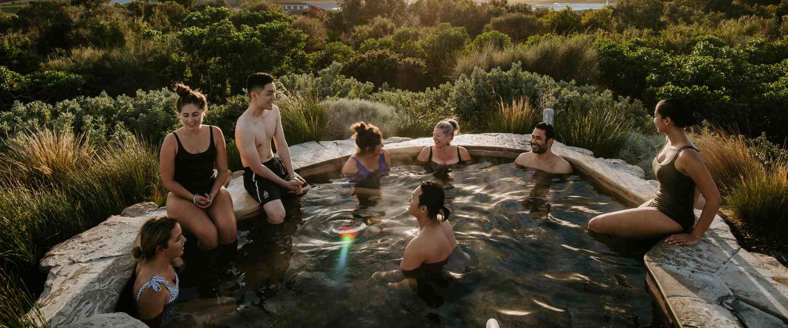 Group of people in hot springs in natrure