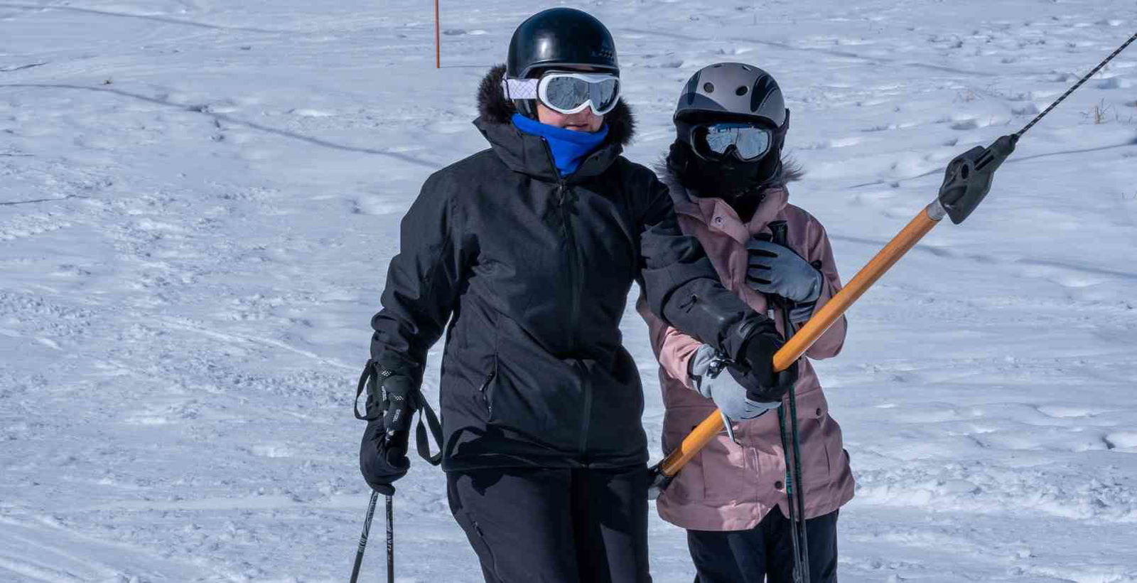 people taking sling lift at mt buller